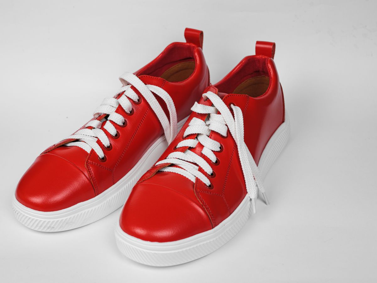 Red sneakers on a light background
